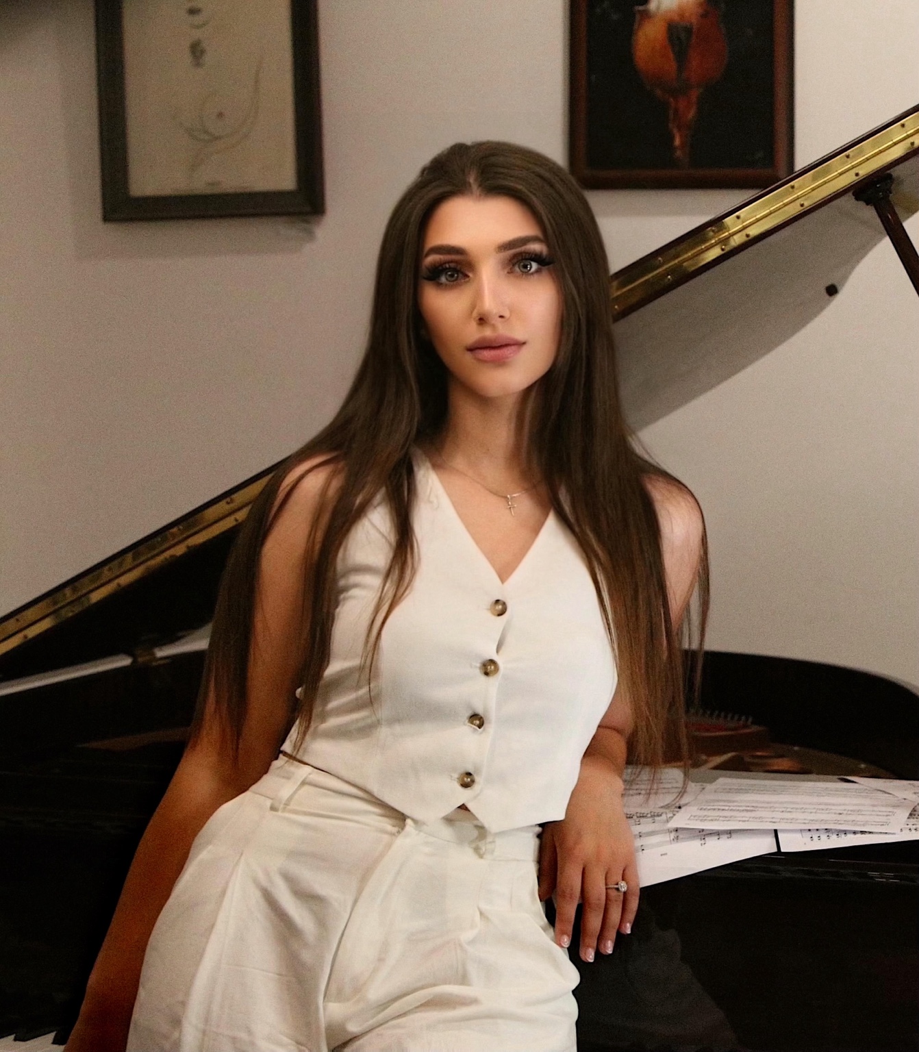 Luiza Arutiunian beside the grand piano