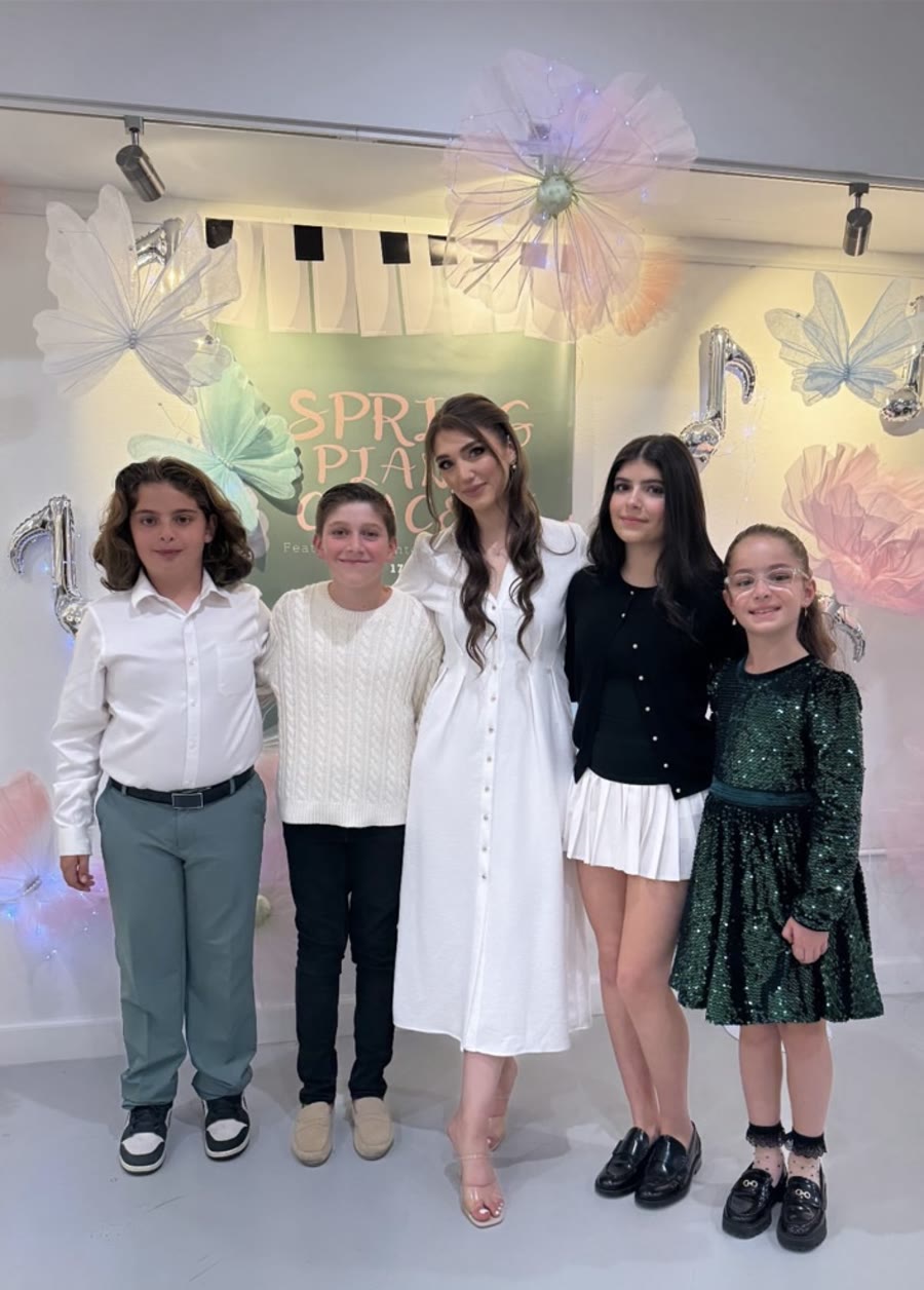 Luiza with students after a concert